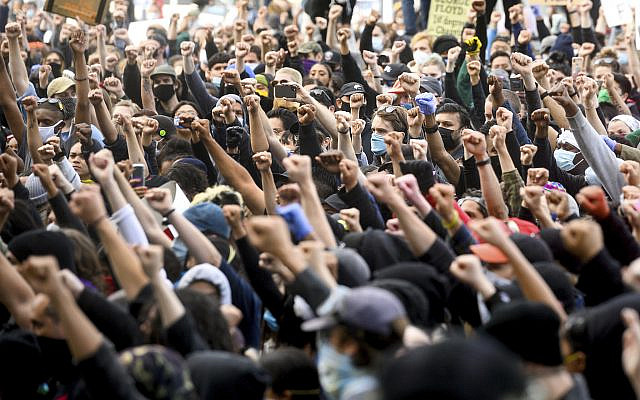 Demonstrators rally in San Francisco, California, on May 31, 2020, protesting the death of George Floyd, who died after being restrained by Minneapolis police officers on May 25, 2020. (AP Photo/Noah Berger)