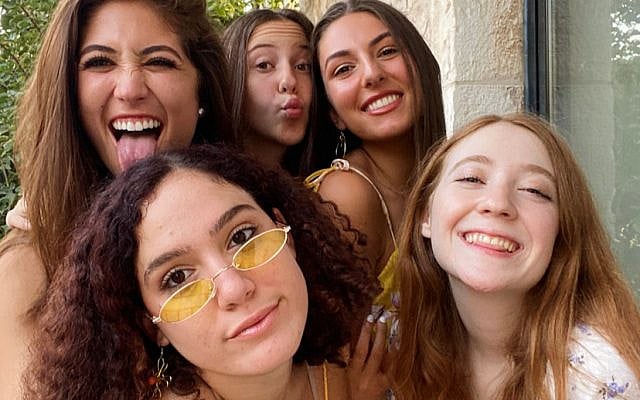 My roommates and I all dressed up on our balcony for the first shabbat in quarantine.