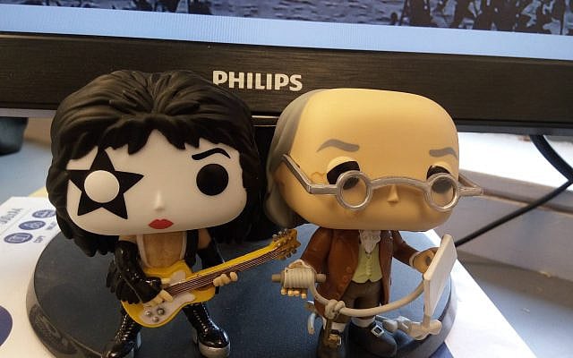 Figurines of (l-r) Paul Stanley and Benjamin Franklin. (David Sedley)