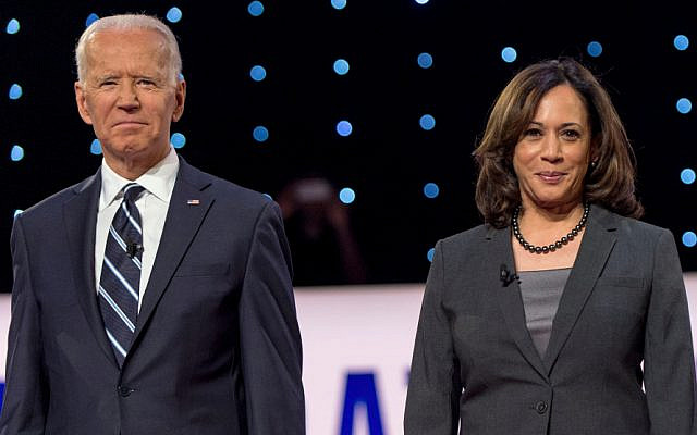 July 31, 2019 - Detroit, Michigan, U.S. -   JOE BIDEN and KAMALA HARRIS pose for the photo spray during a commercial break at the second of two Democratic Debates in Detroit hosted by CNN and sanctioned by the DNC.(Credit Image: © Brian Cahn/ZUMA Wire)