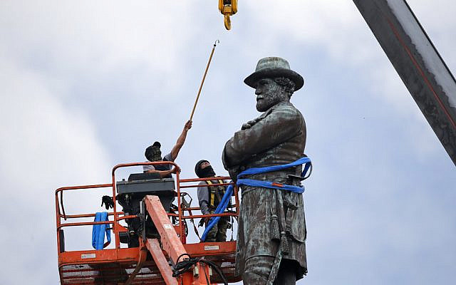 ILLUSTRATIVE: In this Friday, May 19, 2017, file photo, workers prepare to take down the statue of former Confederate Gen. Robert E. Lee, which stands over 100 feet tall, in Lee Circle in New Orleans. (AP Photo/Gerald Herbert, File) ILLUSTRATIVE: In this Friday, May 19, 2017, file photo, workers prepare to take down the statue of former Confederate Gen. Robert E. Lee, which stands over 100 feet tall, in Lee Circle in New Orleans. (AP Photo/Gerald Herbert, File)