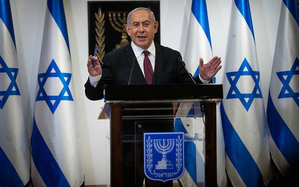 Prime Minister Benjamin Netanyahu gives a statement to the media in the Knesset in Jerusalem, December 22, 2020. (Yonatan Sindel/Flash90)