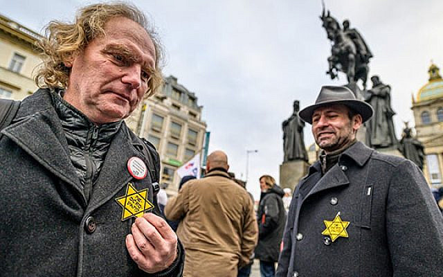 Protesters in Prague displaying their yellow Star of David patches that say "unvaccinated" on January 8, 2021 (taken from Romea.cz) Protesters in Prague displaying their yellow Star of David patches that say "unvaccinated" on January 8, 2021 (taken from Romea.cz)