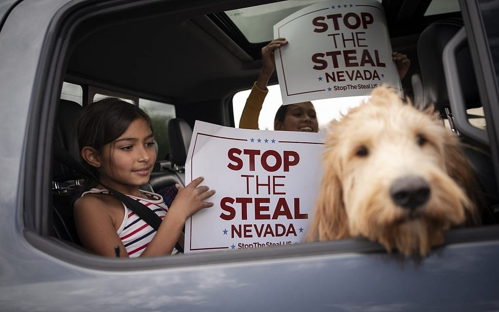 Supporters of President Donald Trump gather outside of the Clark County Elections Department in North Las Vegas, Nev. Saturday, Nov. 7, 2020. (AP Photo/Wong Maye-E) Supporters of President Donald Trump gather outside of the Clark County Elections Department in North Las Vegas, Nev. Saturday, Nov. 7, 2020. (AP Photo/Wong Maye-E)