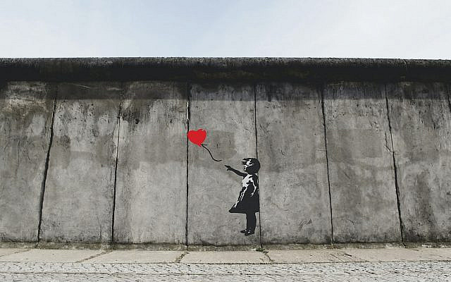 Banksy's artwork in Berlin, Germany (Photo by Eric Ward on Unsplash via Jewish News) Banksy's artwork in Berlin, Germany (Photo by Eric Ward on Unsplash via Jewish News)