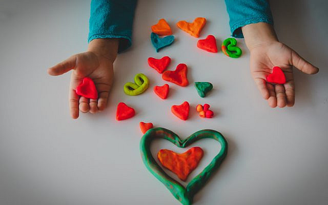 Making hearts from clay for Valentine's Day. (iStock)