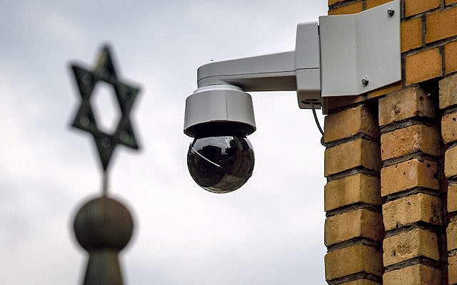 A surveillance camera can be seen next to a Star of David (Photo: Hendrik Schmidt/dpa-Zentralbild/dpa) via Jewish News