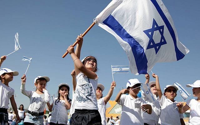 Preschool children from the southern city of Ashkelon, celebrating Israel Independence Day with the flag, on April 18, 2010. (Israel marked the 62nd Independence Day on April 19). (Edi Israel/ FLASH90) Preschool children from the southern city of Ashkelon, celebrating Israel Independence Day with the flag, on April 18, 2010. (Israel marked the 62nd Independence Day on April 19). (Edi Israel/ FLASH90)