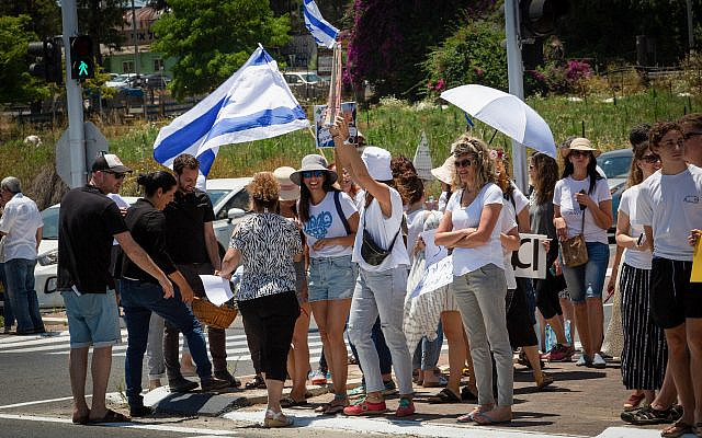 Arabs and Jews protest the escalating violence and riots between the Arab and Jewish population, at Hefer Valley, Northern Israel, on May 14, 2021. Photo by Chen Leopold/FLASH90