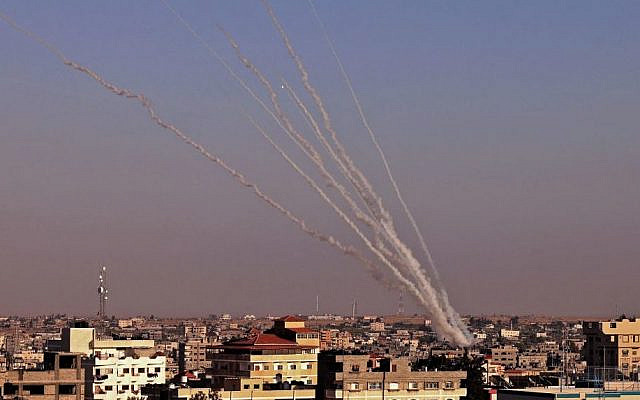 Rockets are launched towards Israel from Rafah, in the southern the Gaza Strip, controlled by the Palestinian Hamas movement, on May 12, 2021. - Heavy exchanges of rocket fire and air strikes, and rioting in mixed Jewish-Arab towns, fuelled fears today that deadly violence between Israel and Palestinians could spiral into 'full-scale war.' (SAID KHATIB / AFP) (Photo by SAID KHATIB/ AFP via Getty Images) Rockets are launched towards Israel from Rafah, in the southern the Gaza Strip, controlled by the Palestinian Hamas movement, on May 12, 2021. - Heavy exchanges of rocket fire and air strikes, and rioting in mixed Jewish-Arab towns, fuelled fears today that deadly violence between Israel and Palestinians could spiral into 'full-scale war.' (SAID KHATIB / AFP) (Photo by SAID KHATIB/ AFP via Getty Images)