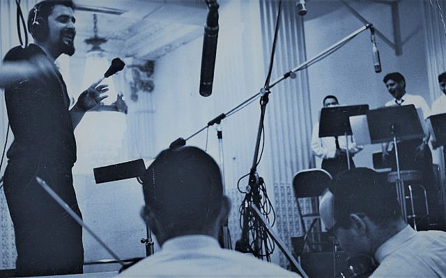 Velvel Pasternak conducting at a recording session in the 1960s (Courtesy)
