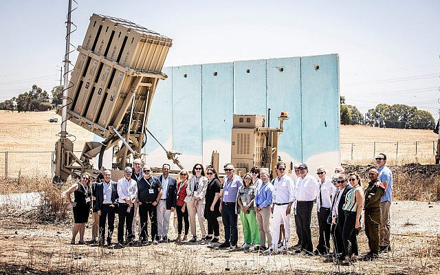 Members of the first solidarity mission of the Jewish Federations of North America in Israel after its May 2021 conflict with Hamas in Gaza visit an Iron Dome anti-rocket installation. (JFNA)