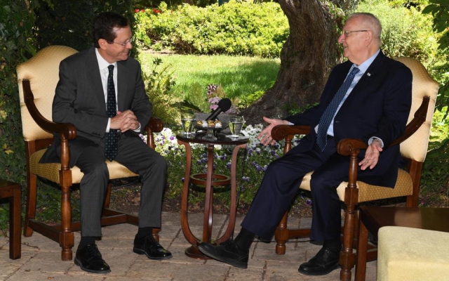 President Reuven Rivlin (R) hosts President-elect Isaac Herzog at the President's Residence in Jerusalem on June 7, 2021. (Mark Neyman/GPO)