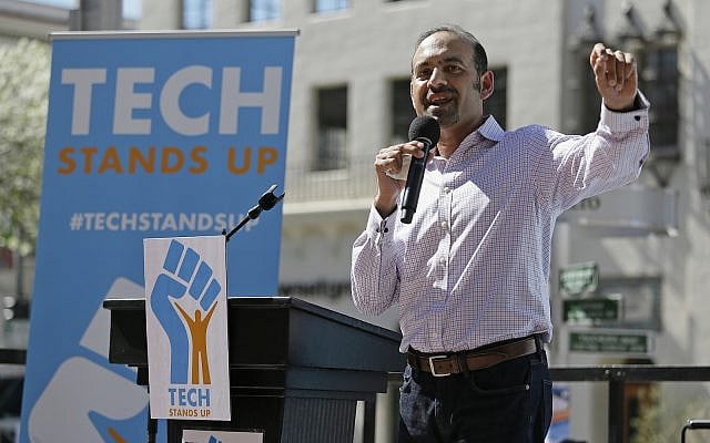 Dilawar Syed, in March 2017, at the time president of the software company Freshdesk, speaks during a Tech Stands Up rally outside City Hall in Palo Alto, Calif.  (AP Photo/Eric Risberg)