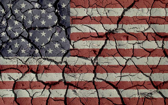 (US flag with mud cracks, iStock)