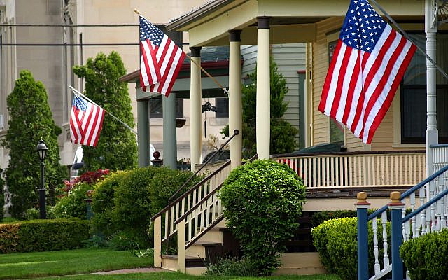(American flags on porches image via iStock)