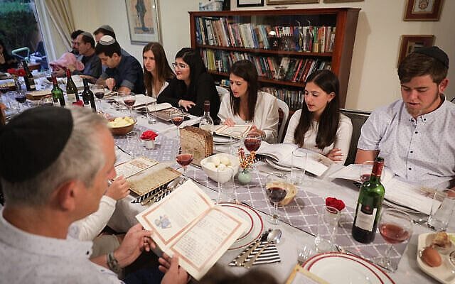 An Israeli family seen during the "passover seder" on the first night of the 8-day long Jewish holiday of Passover, in Rishon le Tzion. March 30 2018. Photo By Nati Shohat/flash 90. An Israeli family seen during the "passover seder" on the first night of the 8-day long Jewish holiday of Passover, in Rishon le Tzion. March 30 2018. Photo By Nati Shohat/flash 90.