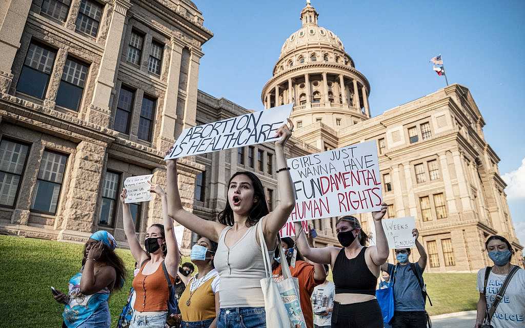 Pro-choice protesters march outside the Texas State Capitol in Austin on Wednesday, Sept. 1, 2021 as Texas passed a law which effectively bans nearly all abortions. (Sergio Flores For The Washington Post via Getty Images)