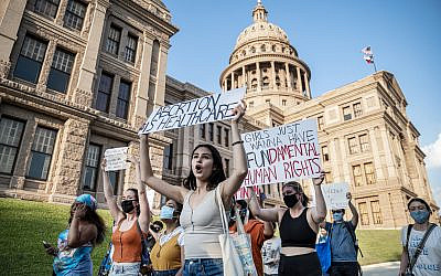Pro-choice protesters march outside the Texas State Capitol in Austin on Wednesday, Sept. 1, 2021 as Texas passed a law which effectively bans nearly all abortions. (Sergio Flores For The Washington Post via Getty Images)