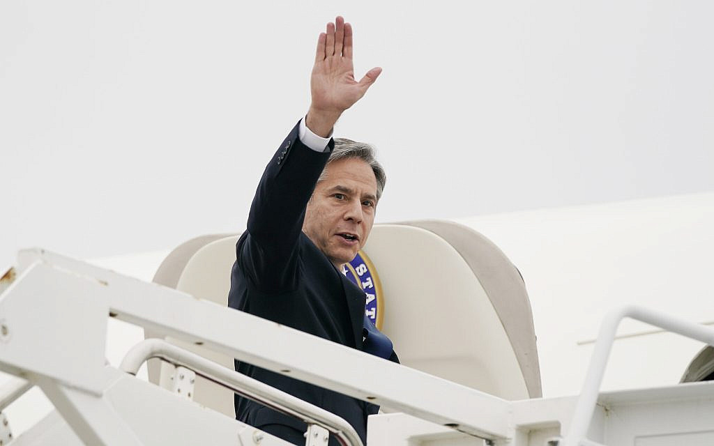 US Secretary of State Antony Blinken waves as he boards a plane on May 24, 2021, at Andrews Air Force Base, Maryland, en route to the Middle East. (AP Photo/Alex Brandon, Pool)