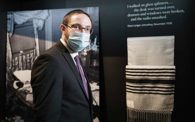 Rabbi Nicky Liss with the prayer shawl which Imperial War Museum officials asked him to help install