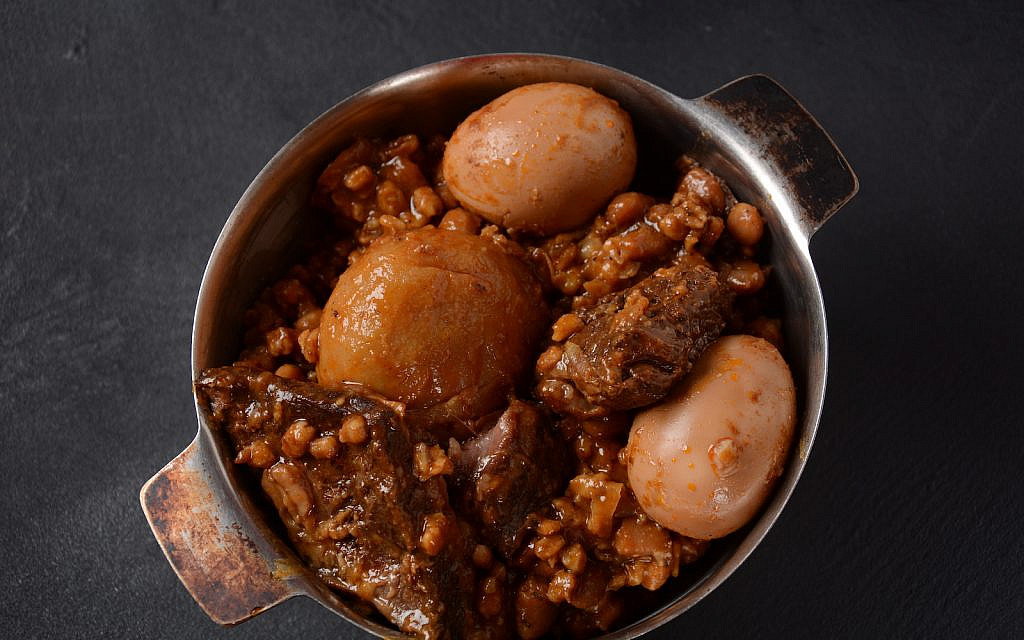 Are Jews required to eat meat on Shabbat and holidays? (Cholent image Nataly Hanin / iStock)