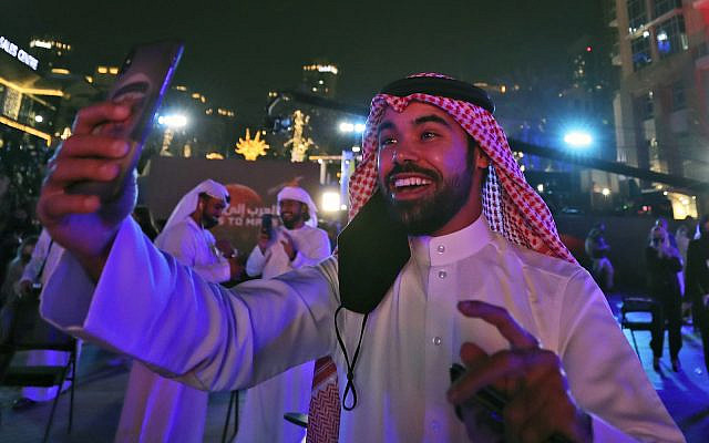 An Emirati man records the celebration after the Hope Probe enters Mars orbit as a part of Emirates Mars mission, in Dubai, United Arab Emirates, Feb. 9, 2021. The spacecraft from the UAE swung into orbit around Mars in a triumph for the Arab world’s first interplanetary mission. (AP/Kamran Jebreili) An Emirati man records the celebration after the Hope Probe enters Mars orbit as a part of Emirates Mars mission, in Dubai, United Arab Emirates, Feb. 9, 2021. The spacecraft from the UAE swung into orbit around Mars in a triumph for the Arab world’s first interplanetary mission. (AP/Kamran Jebreili)