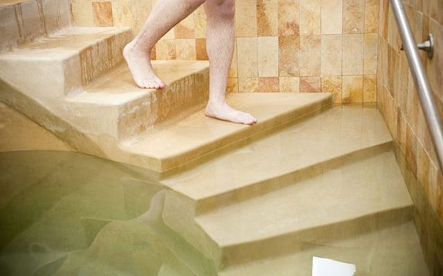 Man entering the mikvah. (Courtesy of Mayyim Hayyim/via JTA)
