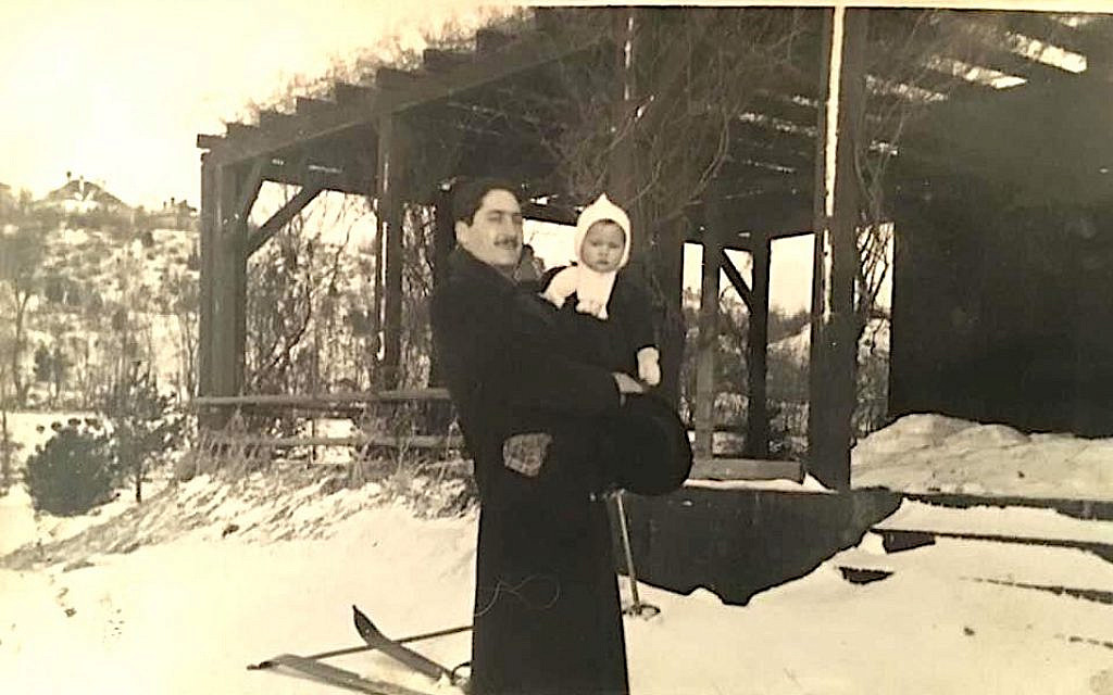 My grandfather, holding my father, as an infant. (courtesy)