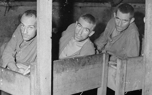 Nearly two months before these men and thousands like them were liberated from the camps, the global Jewish community united to mourn the fate of European Jewry and organize efforts to help the survivors (Photo: George Mallinder / National Archives and Records Administration via United States Holocaust Memorial Museum / Public domain) Nearly two months before these men and thousands like them were liberated from the camps, the global Jewish community united to mourn the fate of European Jewry and organize efforts to help the survivors (Photo: George Mallinder / National Archives and Records Administration via United States Holocaust Memorial Museum / Public domain)