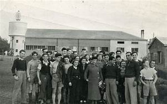 Henrietta Szold, front center, with children from a Youth Aliyah village. (Courtesy of Hadassah, via The Times of Israel)