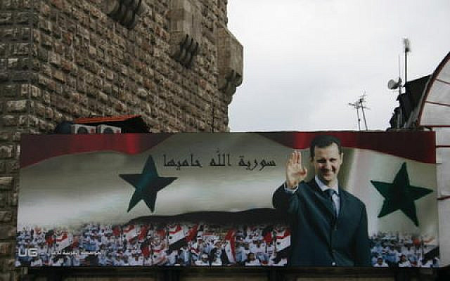 Source: Wikimedia CC license. Billboard with portrait of Assad and the text Allah protects Syria on the old city wall of Damascus 2006 Photo: Bertil Videt, january 2006. Source: Wikimedia CC license. Billboard with portrait of Assad and the text Allah protects Syria on the old city wall of Damascus 2006 Photo: Bertil Videt, january 2006.