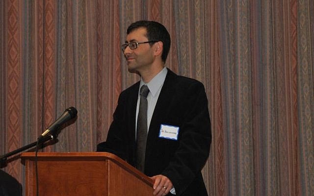 Dr. Isaac Hollander z"l moderating his Modern Middle East Conference 2011. Bnei Akiva Schools, Toronto, Canada Dr. Isaac Hollander z"l moderating his Modern Middle East Conference 2011. Bnei Akiva Schools, Toronto, Canada