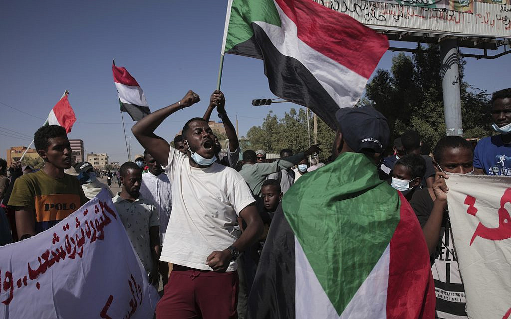 Thousands of protesters take to the streets to renew their demand for a civilian government in the Sudanese capital Khartoum, Thursday, Nov. 25, 2021 (AP Photo/Marwan Ali) Thousands of protesters take to the streets to renew their demand for a civilian government in the Sudanese capital Khartoum, Thursday, Nov. 25, 2021 (AP Photo/Marwan Ali)