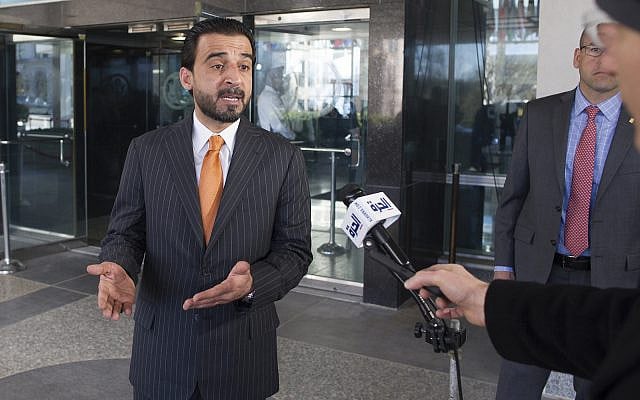 Iraqi Speaker of Parliament Mohammad Halbousi speaks with reporters as he departs the Department of State after meeting with Secretary of State Mike Pompeo, in Washington, March 28, 2019. (AP Photo/Cliff Owen)