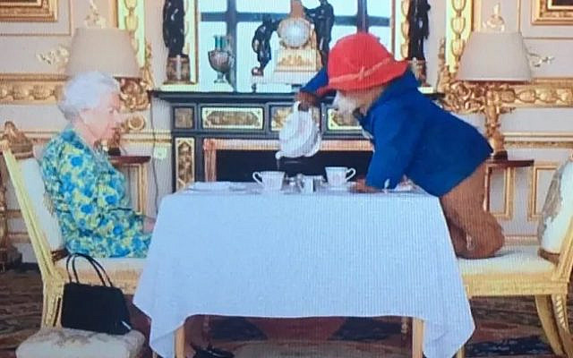 Queen Elizabeth II and Paddington Bear, at tea. (Twitter) Queen Elizabeth II and Paddington Bear, at tea. (Twitter)