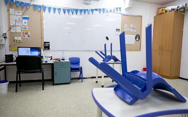 Illustrative: An empty classroom at Cramim school in Beit Hakerem, Jerusalem, on October 21, 2020. (Olivier Fitoussi/Flash90)