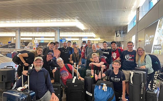 The Maccabi Media team poses for a picture upon arrival to Ben Gurion Airport.