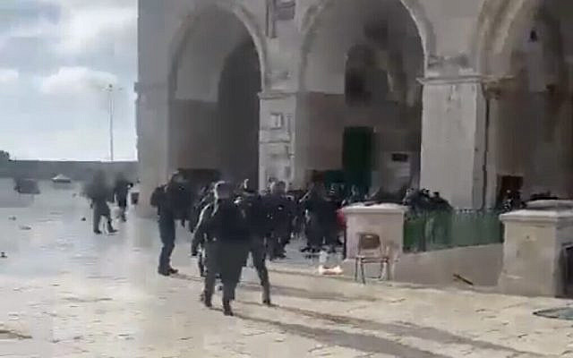 Police are seen during clashes with Palestinians on the Temple Mount, May 5, 2022. (Screen capture: Twitter) Police are seen during clashes with Palestinians on the Temple Mount, May 5, 2022. (Screen capture: Twitter)