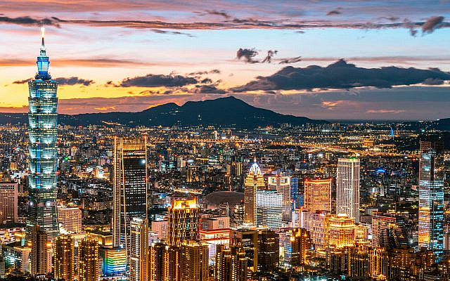 Aerial View of City Buildings and Taipei 101 during Night Time on September 11, 2021. Photographer: Jimmy Liao via Pexels