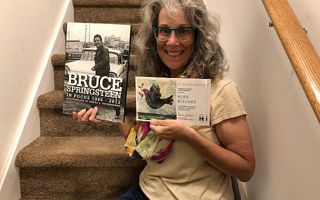 Author Hope Blecher, Ed. D with her Bruce Springsteen memorabilia and her Hadassah Certificate of Achievement.  Photo courtesy of the author.