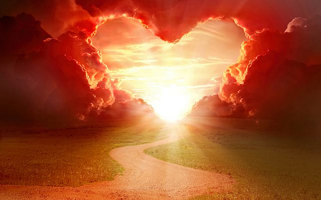 Heart-shaping clouds at sunset. (iStock)