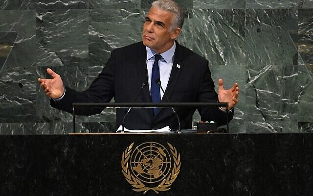Israel's Prime Minister Yair Lapid addresses the 77th session of the United Nations General Assembly at the UN headquarters in New York City on September 22, 2022. (Photo by TIMOTHY A. CLARY / AFP) Israel's Prime Minister Yair Lapid addresses the 77th session of the United Nations General Assembly at the UN headquarters in New York City on September 22, 2022. (Photo by TIMOTHY A. CLARY / AFP)