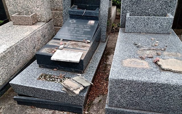 Some of the vandalized graves at the Tablada Jewish cemetery near Buenos Aires. (Courtesy of AMIA via JTA) Some of the vandalized graves at the Tablada Jewish cemetery near Buenos Aires. (Courtesy of AMIA via JTA)