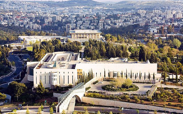 The Supreme Court in the foreground and Knesset in the background. Note the path connecting the two - the source of tempest that has swept up the nation. Credit: Wikimedia Commons.