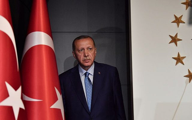 Turkish President Recep Tayyip Erdogan arrives to deliver a speech on June 24, 2018 in Istanbul, after initial results of Turkey's presidential and parliamentary elections.
Erdogan on June 24 declared victory in a tightly-contested presidential election, extending his 15-year grip on power in the face of a revitalised opposition. Turkish voters had for the first time cast ballots for both president and parliament in the snap polls, with Erdogan looking for a first round knockout and an overall majority for his ruling Justice and Development Party (AKP).
/ AFP PHOTO / Bulent Kilic Turkish President Recep Tayyip Erdogan arrives to deliver a speech on June 24, 2018 in Istanbul, after initial results of Turkey's presidential and parliamentary elections.
Erdogan on June 24 declared victory in a tightly-contested presidential election, extending his 15-year grip on power in the face of a revitalised opposition. Turkish voters had for the first time cast ballots for both president and parliament in the snap polls, with Erdogan looking for a first round knockout and an overall majority for his ruling Justice and Development Party (AKP).
/ AFP PHOTO / Bulent Kilic