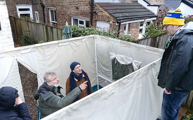 Gary (second left), in a succah, directing an episode of series two of Hapless.