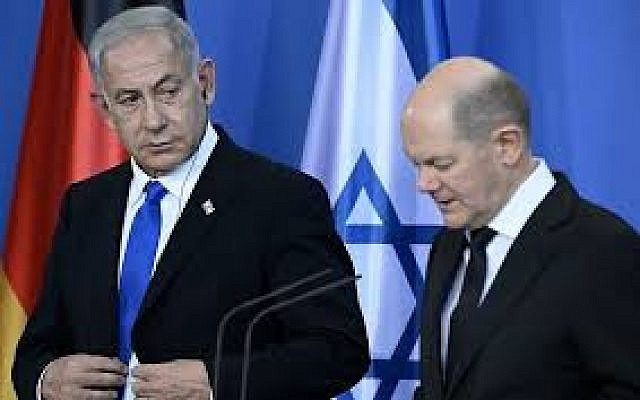 German Chancellor Olaf Scholz (R) and Prime Minister Benjamin Netanyahu speak during a joint press conference following talks at the Chancellery in Berlin on March 16, 2023. (Tobias Schwarz/AFP)