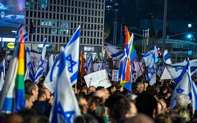 TEL AVIV, ISRAEL - January 21, 2023: Israelis protest in Tel Aviv against plans by prime minister Benjamin Netanyahu . TEL AVIV, ISRAEL - January 21, 2023: Israelis protest in Tel Aviv against plans by prime minister Benjamin Netanyahu .
