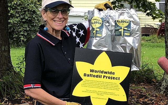 The author with the Daffodil Project logo. Photo courtesy of the author. The author with the Daffodil Project logo. Photo courtesy of the author.